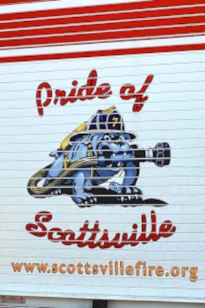 Drwing of fire truck on side of building with words "The Pride of Scottsville"
